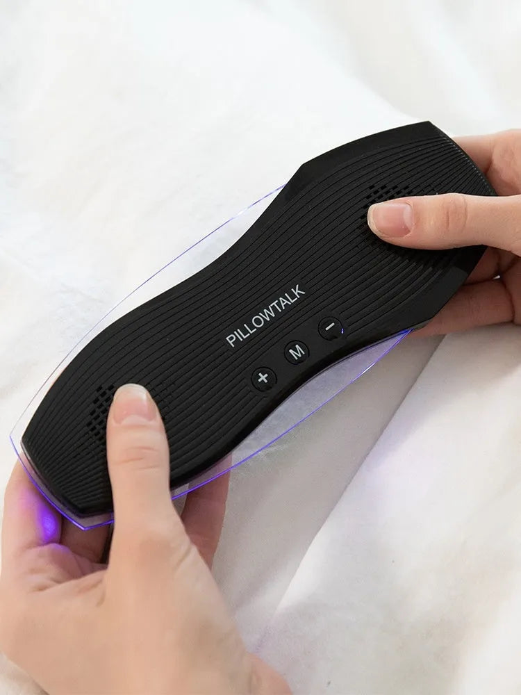 Black wireless sleeping earbuds with Bluetooth connectivity and built-in microphone
