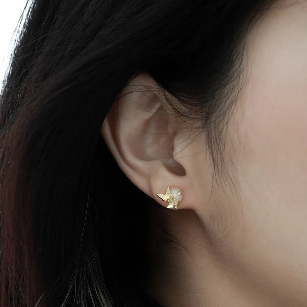 Butterfly ear studs in 925 sterling silver with electroplated white gold or gold finish and zodiac animal design