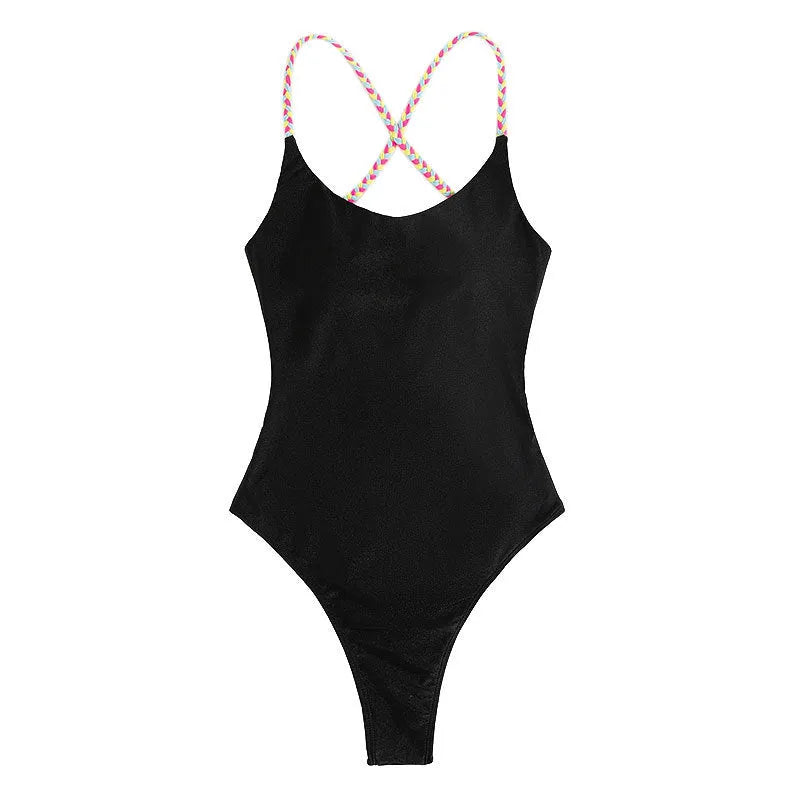 Black backless one-piece swimsuit with sleeveless design on mannequin