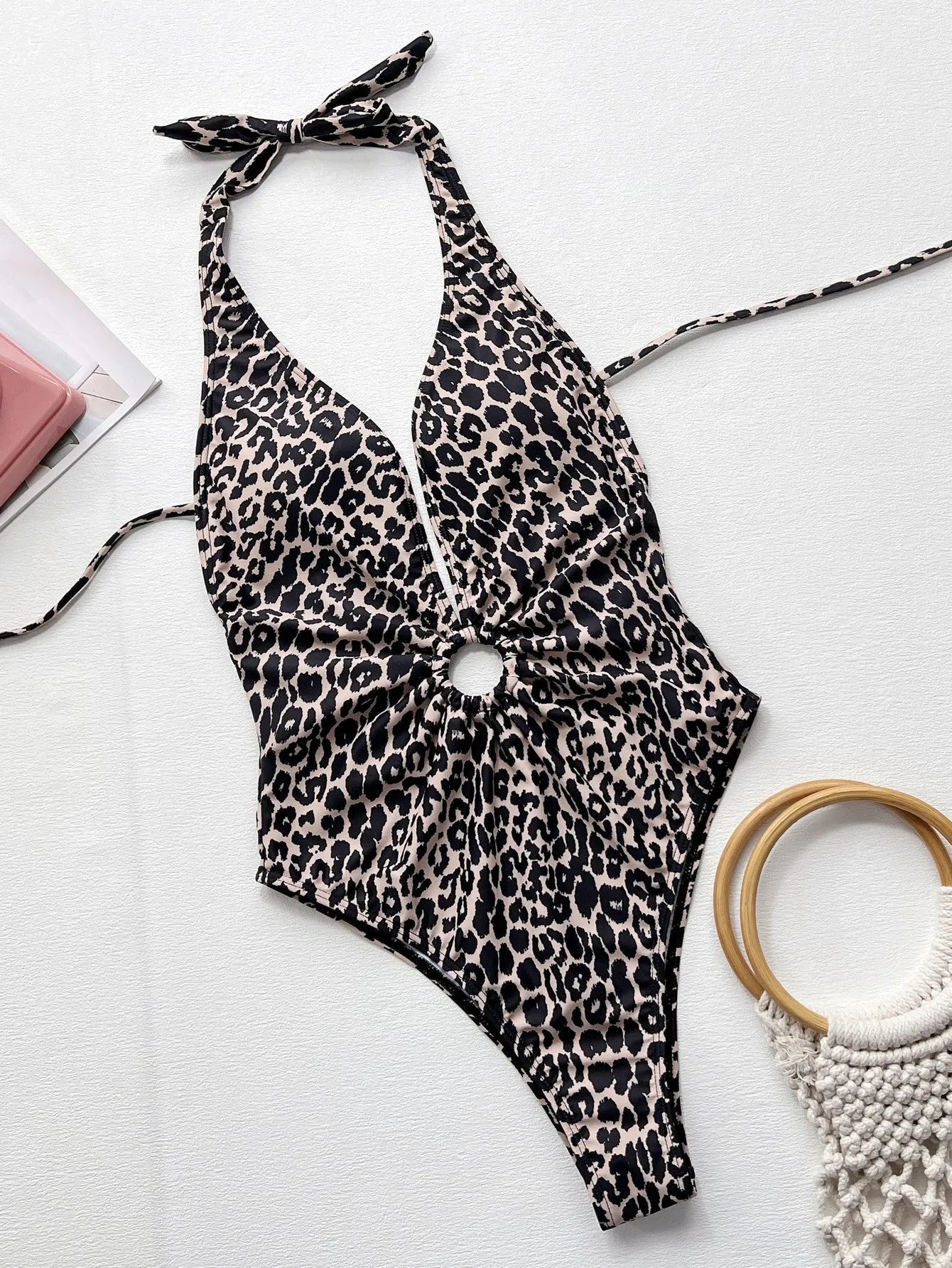 Leopard print one-piece swimsuit for women with hollow-out ring design detail.