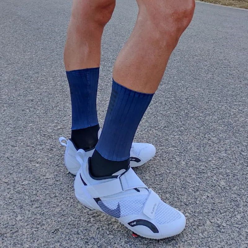 A pair of athletic sports socks for cycling and running, shown in one of six available colours.