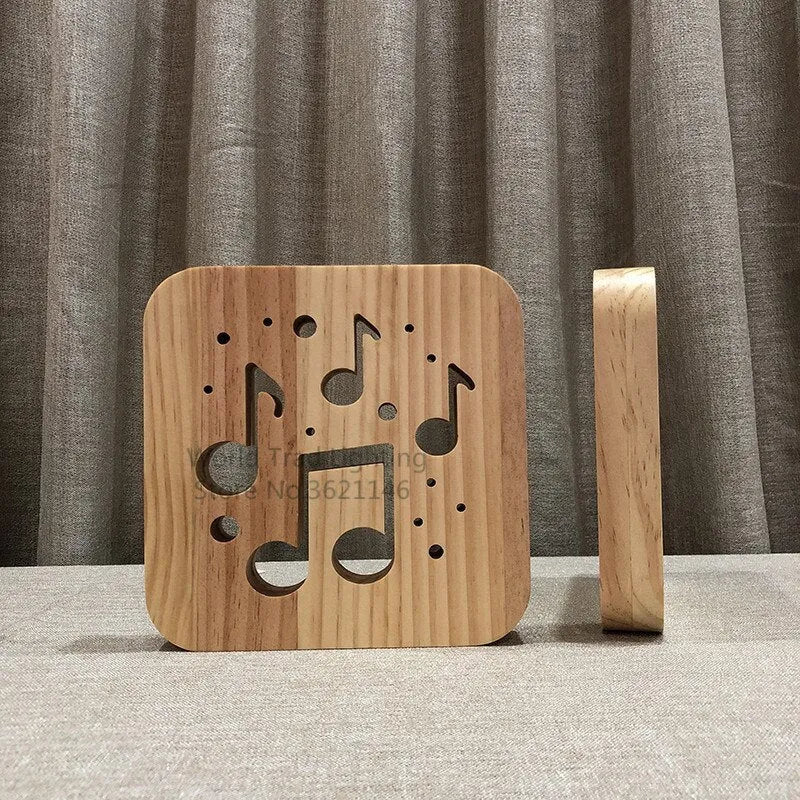 Square pine wood USB LED atmosphere lamp with warm white light on a surface.