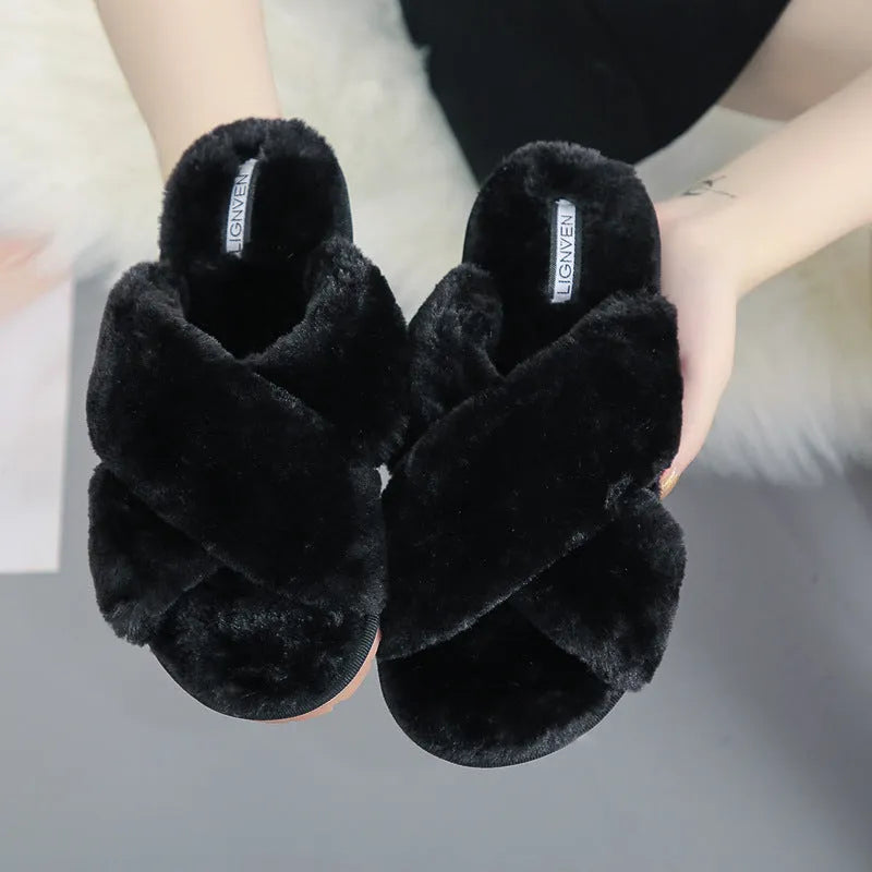 Cross open-toe fur slippers in various colours on a patterned non-slip sole.