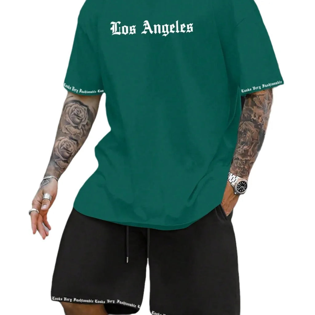 Man wearing a grey short sleeve athletic top and matching shorts from a polyester sportswear set.