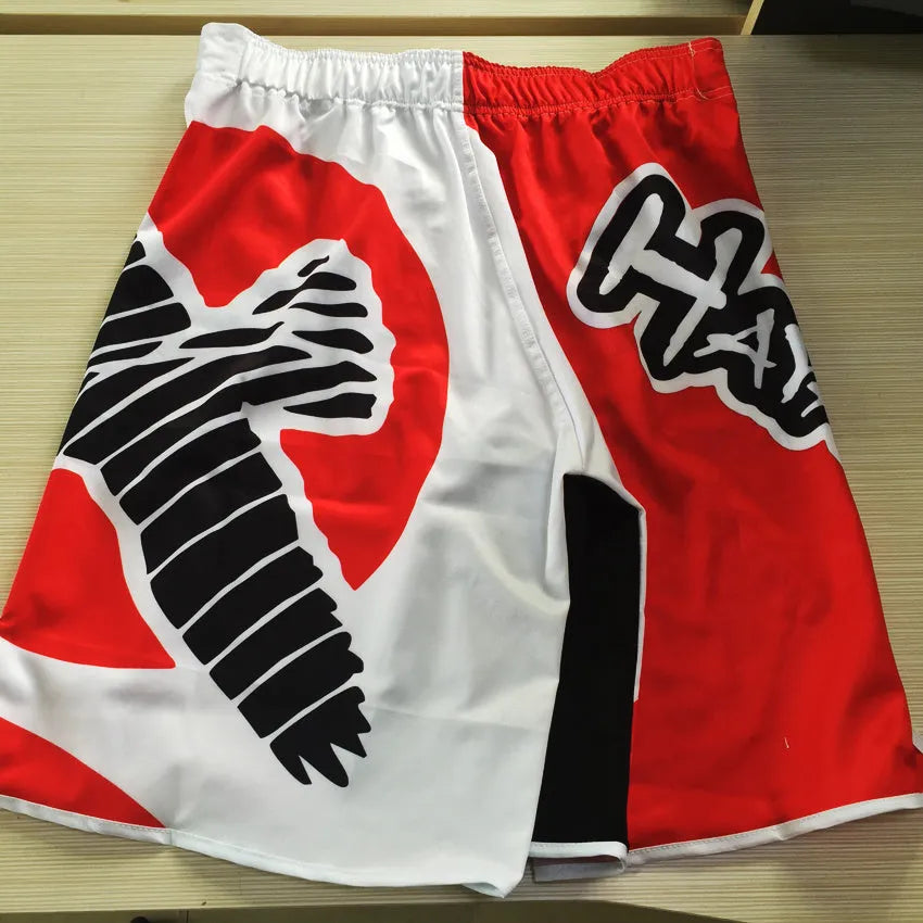 Loose Lycra free kick fighting training shorts in Black, Blue, or Red, sizes 3XL to M