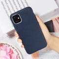 Leather phone case with TPU construction for iPhone, available in black, brown, navy blue and wine red.