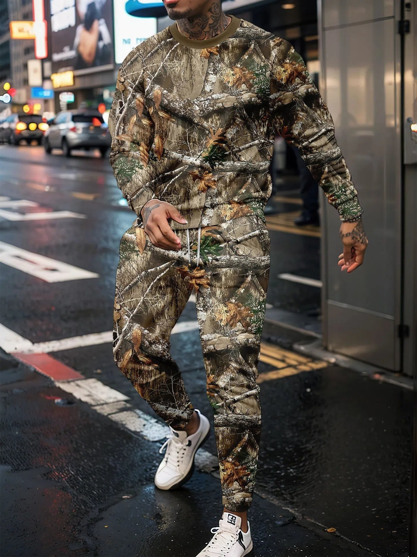 Two-piece jungle camouflage sportswear set with long-sleeve round neck top and matching trousers on a male model