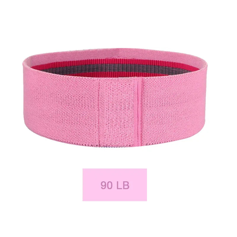 Squat resistance band hip ring in green, pink, or purple, made from latex silk and polyester webbing for fitness training.