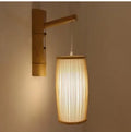 Handwoven bamboo plaited table lamp with soft glow for bedroom or hall decoration