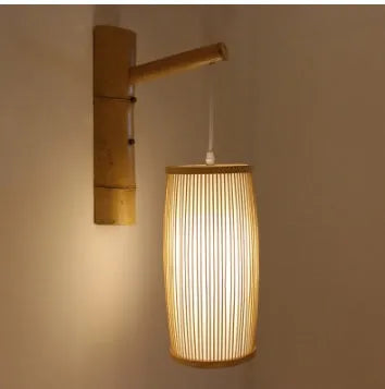 Handwoven bamboo plaited table lamp with soft glow for bedroom or hall decoration
