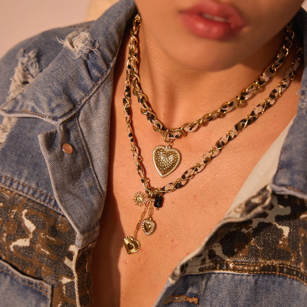 Geometric leopard love design pendant on a stainless steel necklace with an adjustable 41-50cm chain.