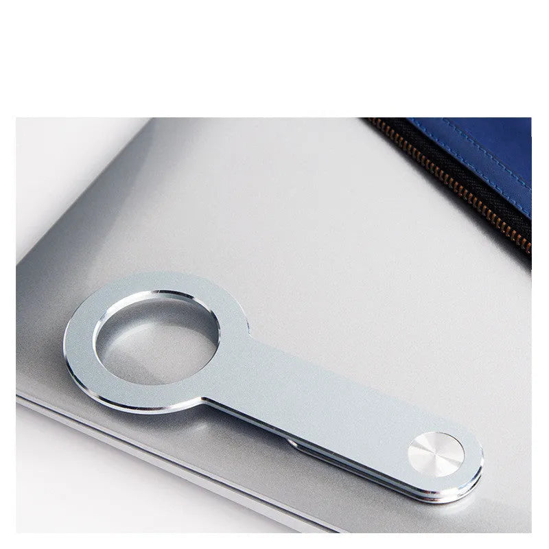 Aluminium alloy magnetic phone holder in metallic silver for desktop use, compatible with Apple 12 and above