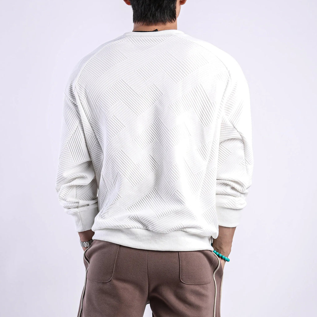 Men's loose fit twill Jacquard pullover sweater in army green, shown on a model.