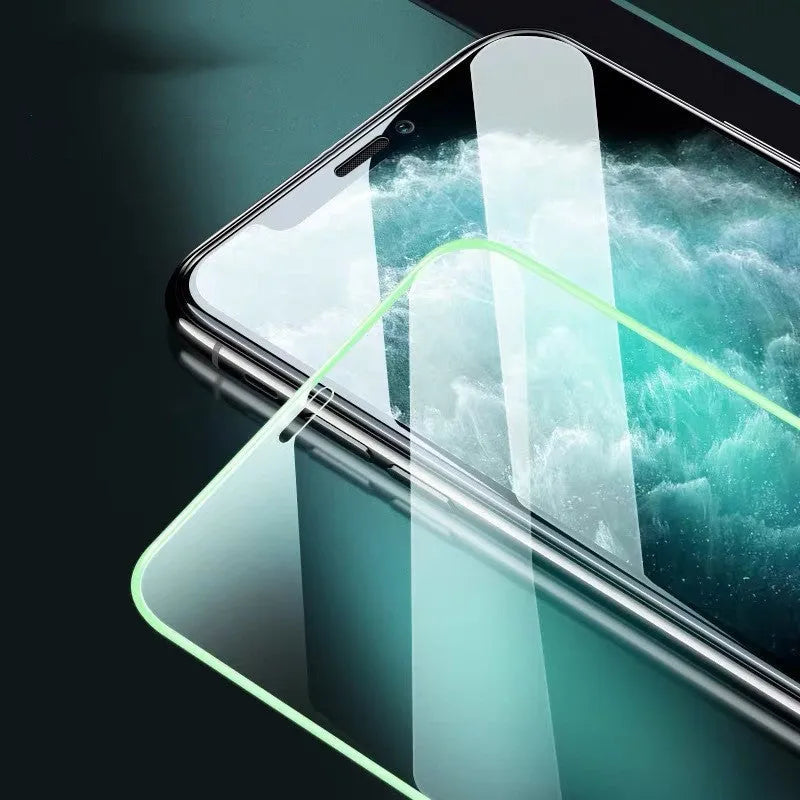 Luminous full cover tempered glass screen protector for iPhone glowing in dark with anti-scratch features.