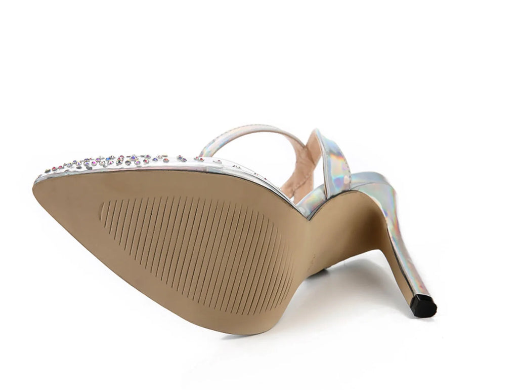 Women's pointed toe stiletto sandals with diamond details on a PVC upper.