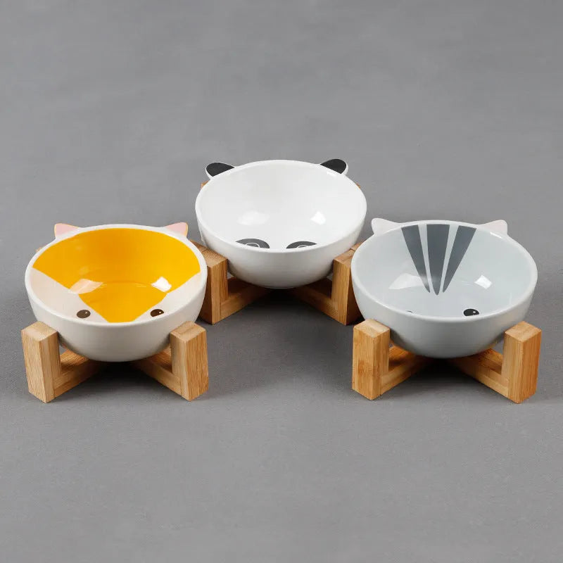 Raised ceramic cat food bowl in bamboo wooden stand, 13cm bowl, pink fox design