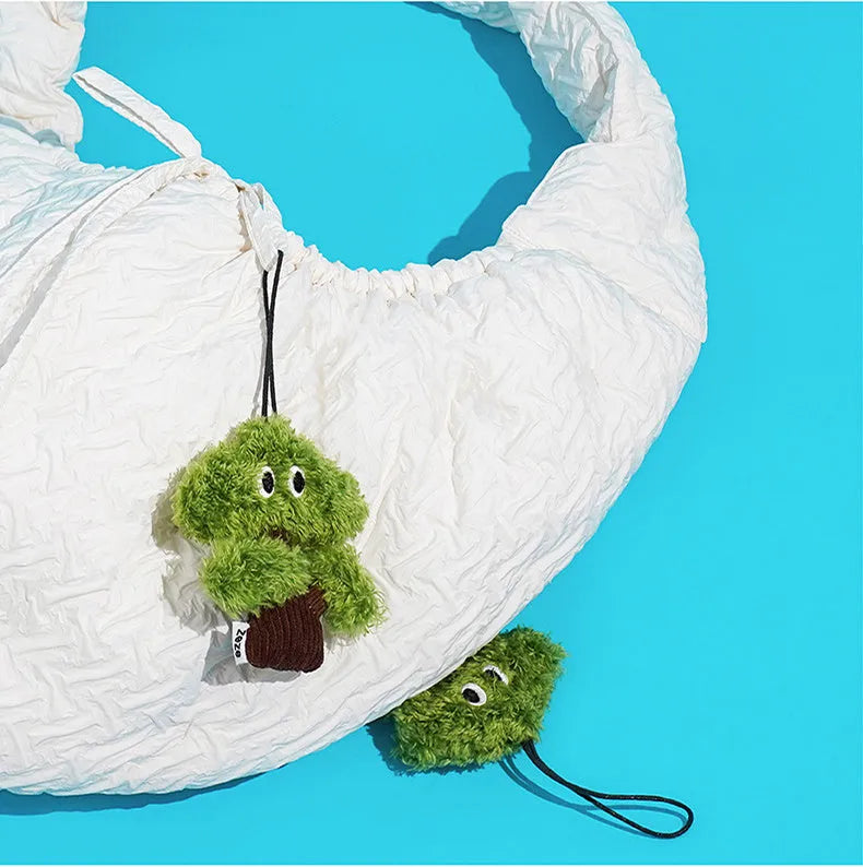 Felt pine tree shaped cat toy with cotton rope hanger and cat mint scent.