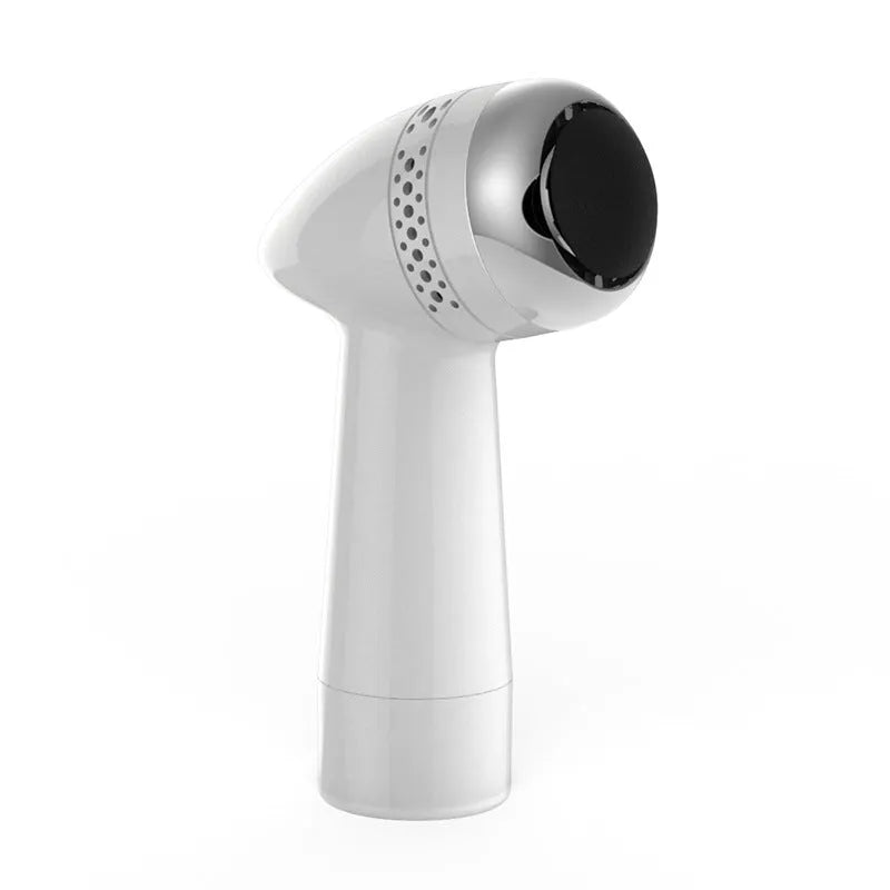 Electric vacuum foot grinder with quartz grinding head in a metallic finish, shown removing calluses on dry skin.