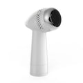 Electric vacuum foot grinder with quartz grinding head in a metallic finish, shown removing calluses on dry skin.