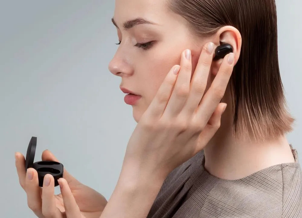 Redmi AirDots 2 Black true wireless Bluetooth earbuds and charging case on a white background.