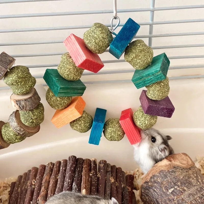Hamster chew toy with straw ball ring in colourful sequin or natural applewood options