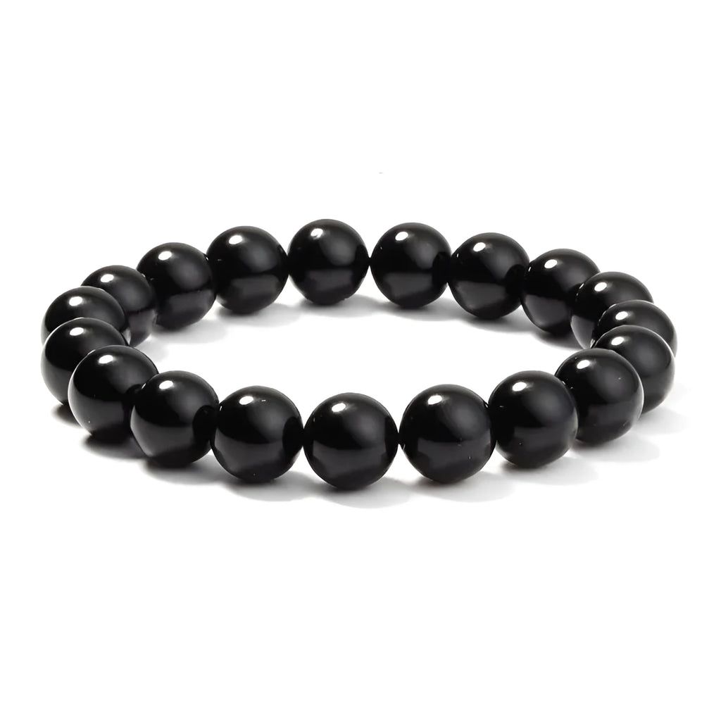 Black onyx bracelet with 8mm geometric agate beads on a black elastic cord.