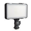Shenniu M150 ultra-thin silver LED video light mounted on a mobile phone with bracket.