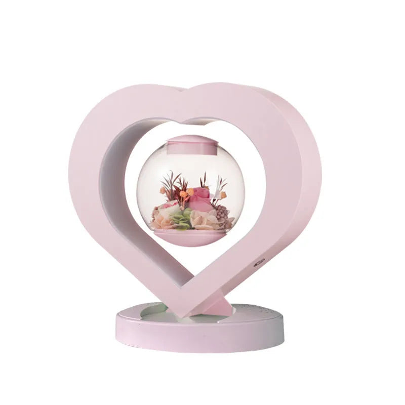 Pink preserved rose ornament with optional base and Bluetooth audio functionality for gift-giving