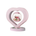 Pink preserved rose ornament with optional base and Bluetooth audio functionality for gift-giving