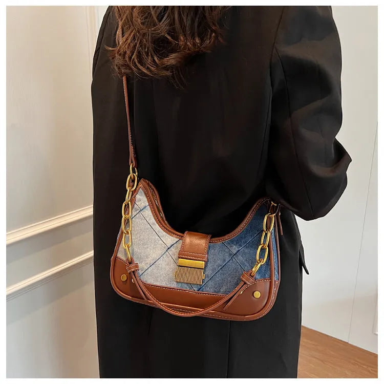 Brown soft denim women's bucket shoulder bag with diamond mesh and chain strap.