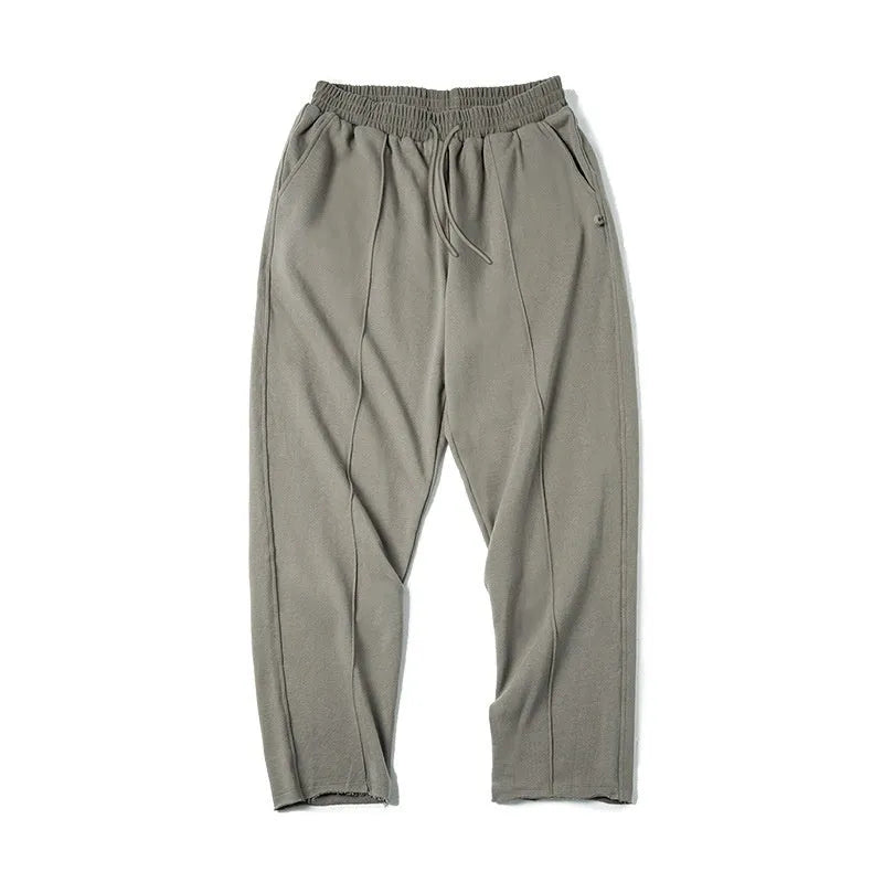 Marden Tooling retro tapered cotton sweatpants in olive green, straight leg with 3D cutting hemming