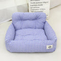 Car-mounted pet travel nest in grey and blue plaid colours showing stain-resistant cloth construction