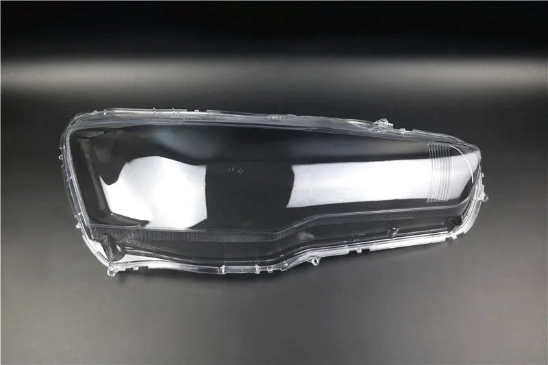 Transparent plastic headlight housing cover measuring 50x30x20mm for vehicle lamp replacement