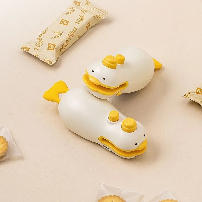 Small yellow duck rechargeable sealing machine with animal jacquard texture and included charging cable