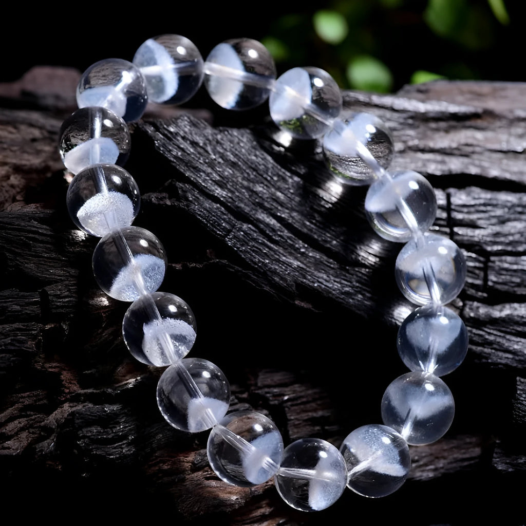 Women's white crystal ghost pyramid bracelet with ruyi element on wrist