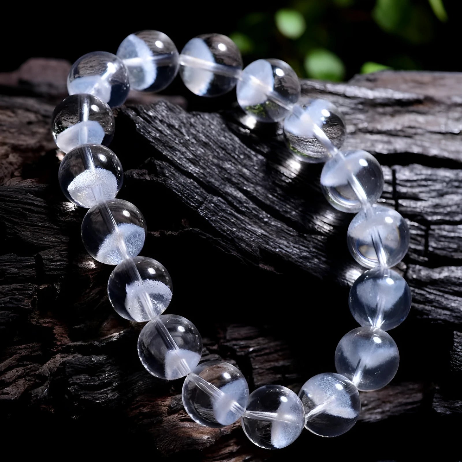 Women's white crystal ghost pyramid bracelet with ruyi element on wrist