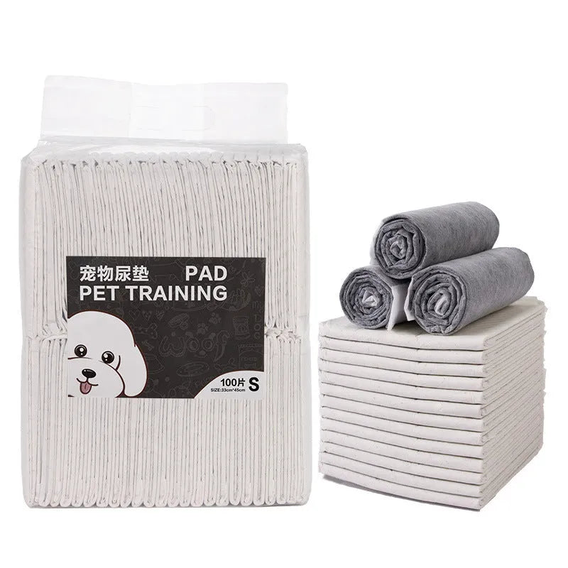 Pack of white pet urinal pads showing size options S, M, L, XL for dogs and cats.