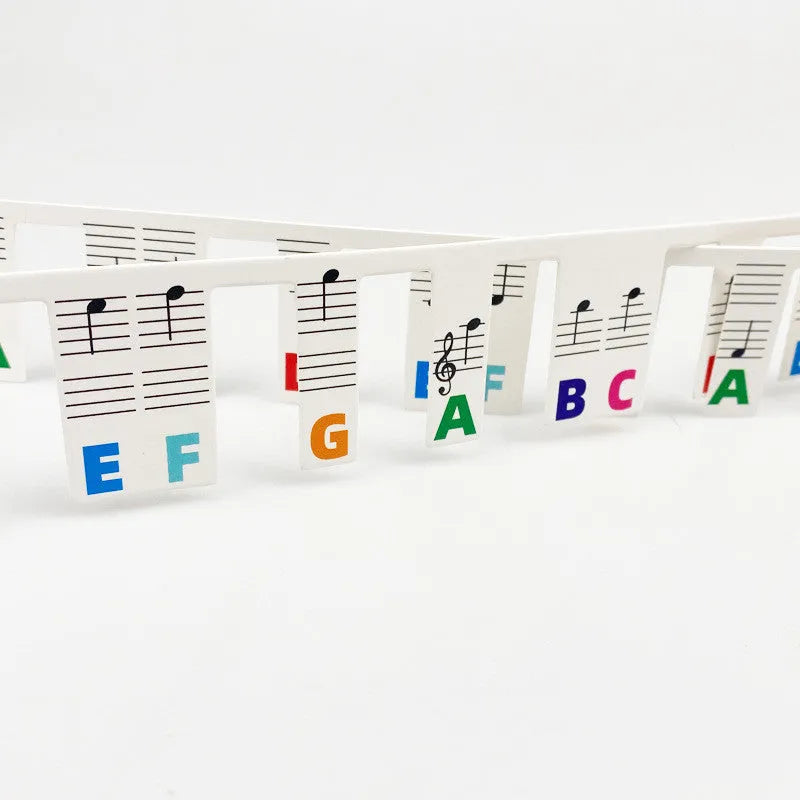 88 key piano note bar keyboard stickers on white card showing black and color note options for music learning