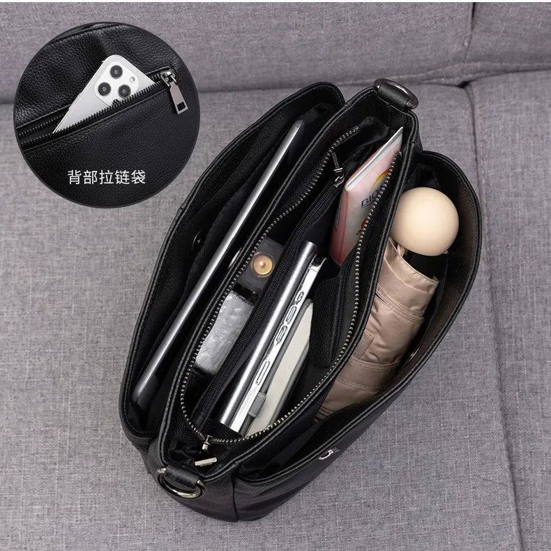 Genuine leather handbag with plaid pattern, single strap, horizontal square shape, medium soft.