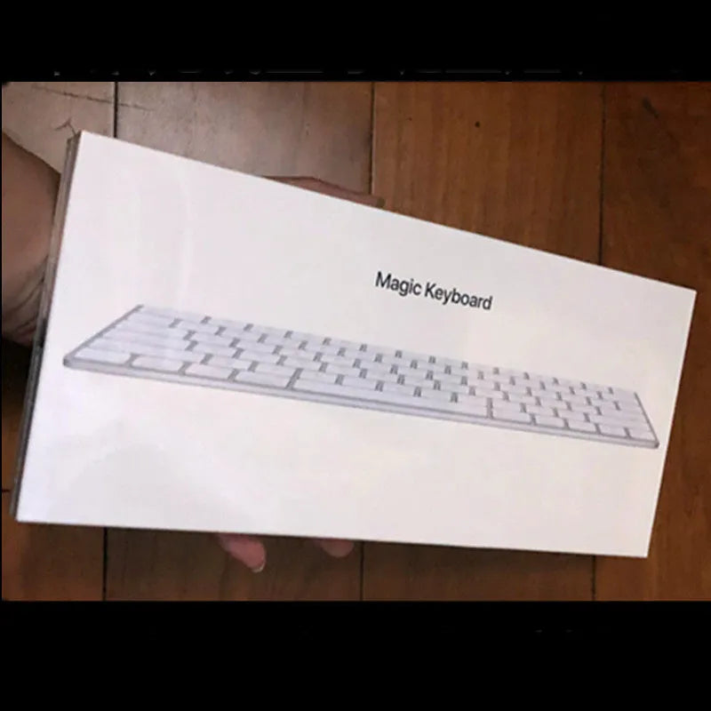 White Apple G6 Bluetooth wireless keyboard with ultra-thin metal construction and multimedia keys