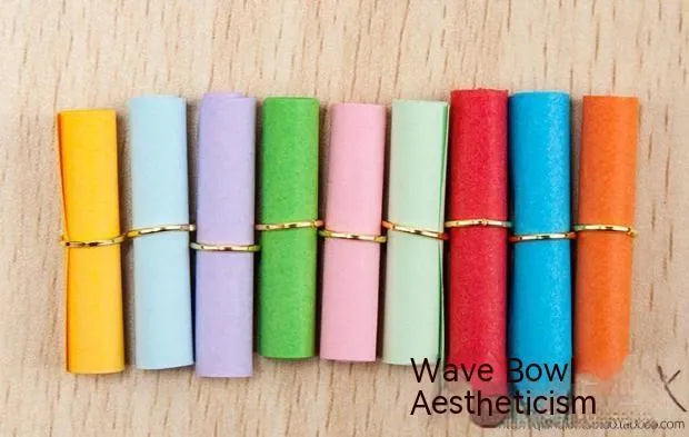 Coloured paper scrolls with metal eyelets in sizes 3x7cm, 4x7cm, 5x5cm, and 7x7cm for message writing.
