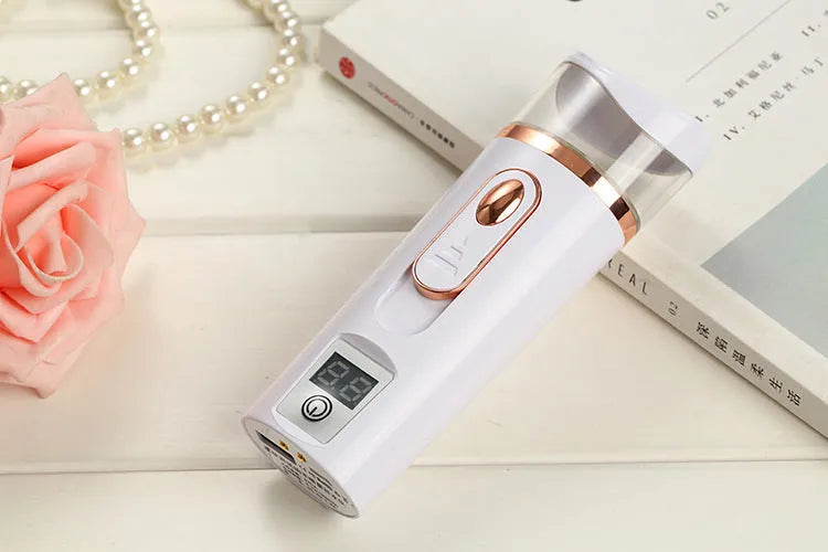 Nano spray water meter 35ml handheld facial mist device in white or pink, 4.6 x 13.5 cm