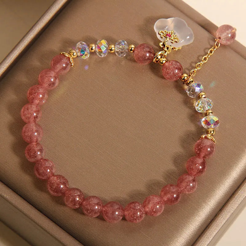 Women's strawberry quartz crystal bracelet with white agate beads and auspicious cloud charms
