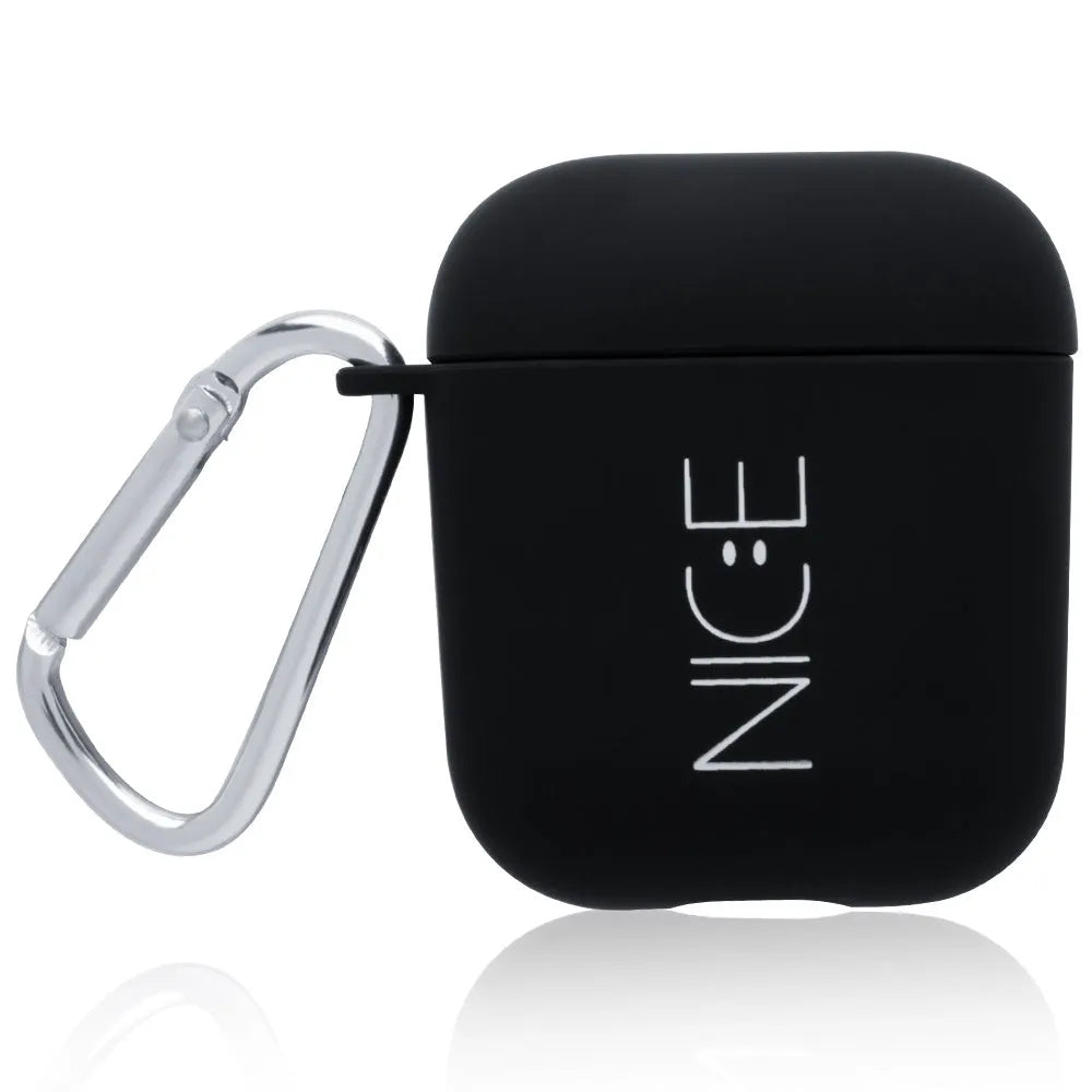 Black AirPods hard case with a smiley face design next to a pink case with a flower pattern.