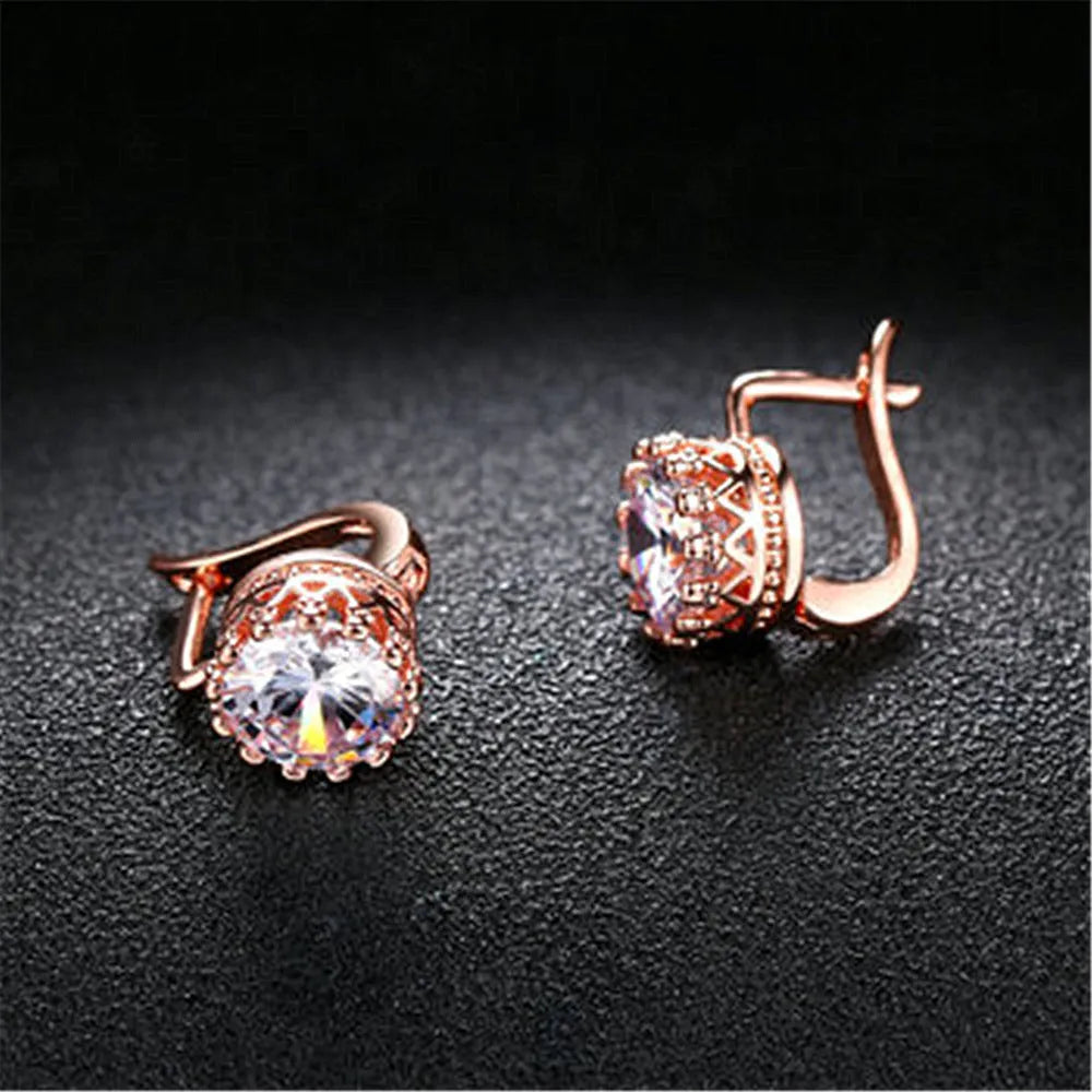 Korean retro crown-shaped clip-on earrings with white diamond accents in rose gold and white gold colours.