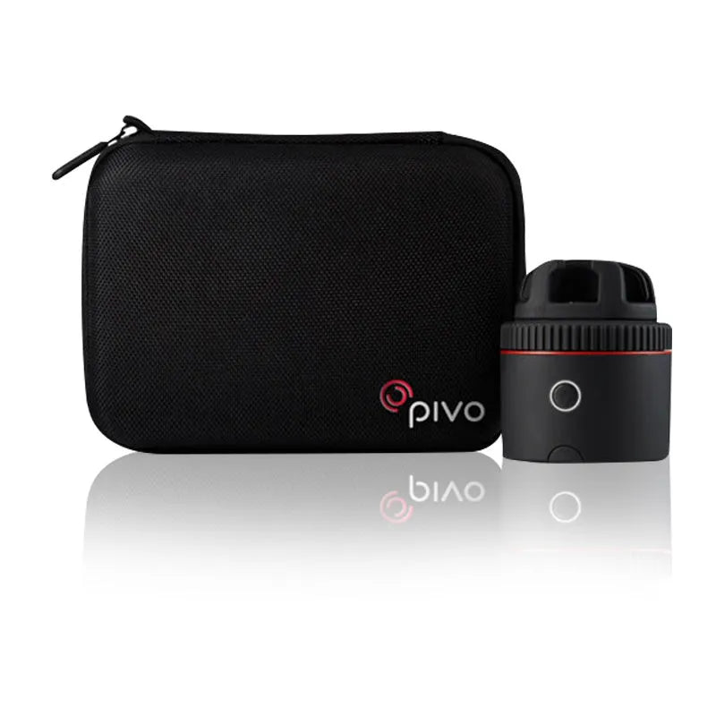 Black PIVO facial tracking smartphone mount on a table, showing 360-degree rotation mechanism.