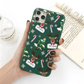 Green TPU iPhone case with cartoon Christmas elk, tree, and stripe design.