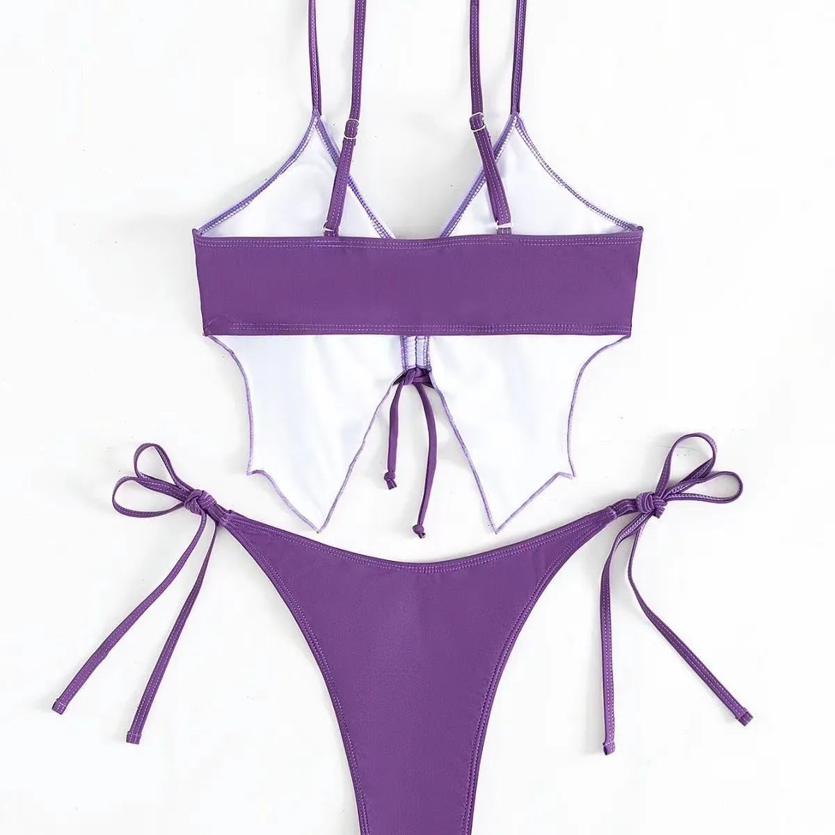 Purple women's bikini suit with a bow on the top and split-style briefs.