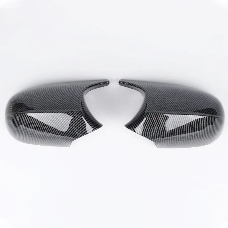 BMW 3 Series E90 rearview mirror replacement shell pair in black and carbon pattern finishes