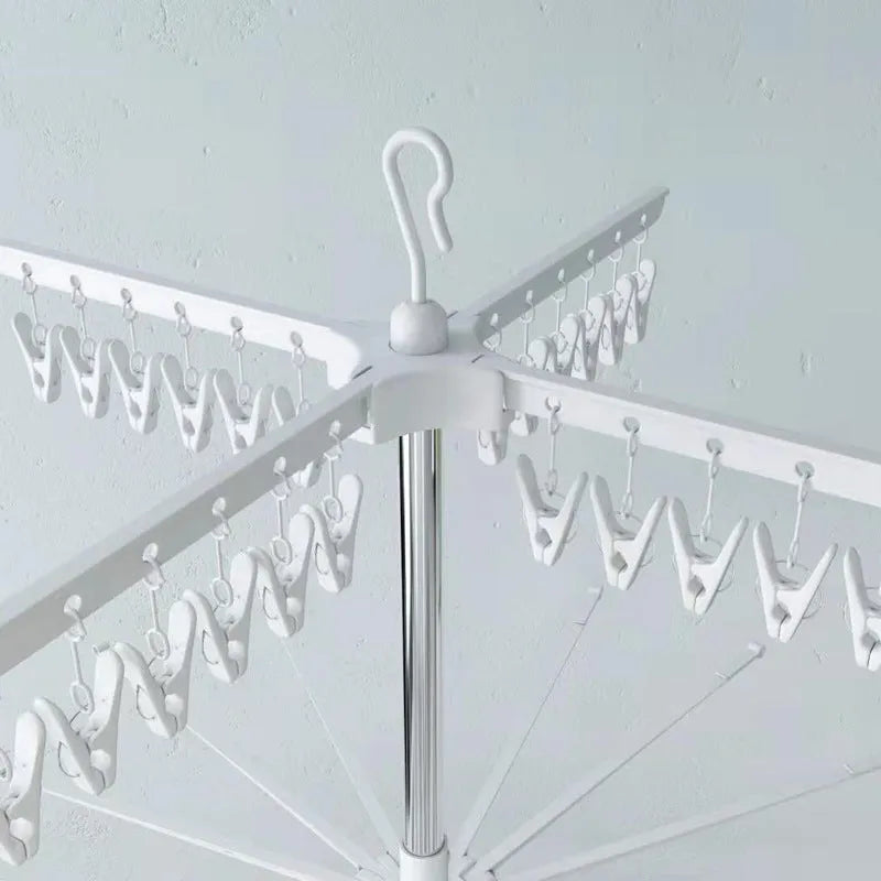 Three-layer stainless steel mobile drying rack with split plastic clips for socks, pants, and ties